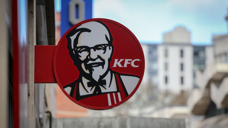 The KFC logo is pictured outside a branch of KFC that is closed due to problems with the delivery of chicken on Feb. 20, 2018 in Bristol, England.